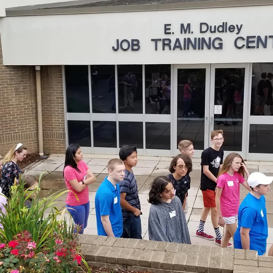 Students on a walking tour of the school campus.