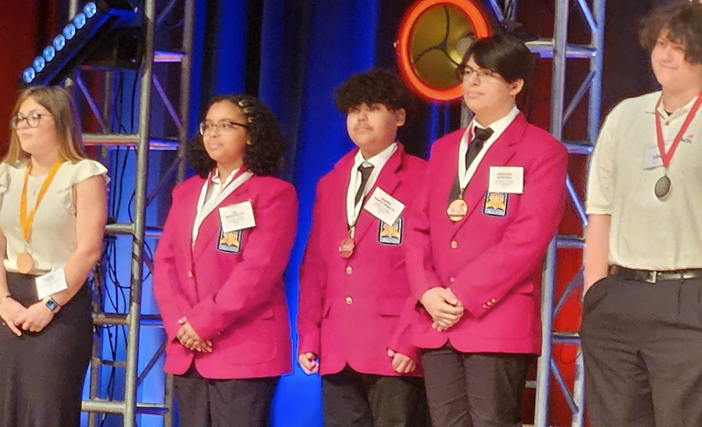 advanced technologies academy students on stage at skillsusa 