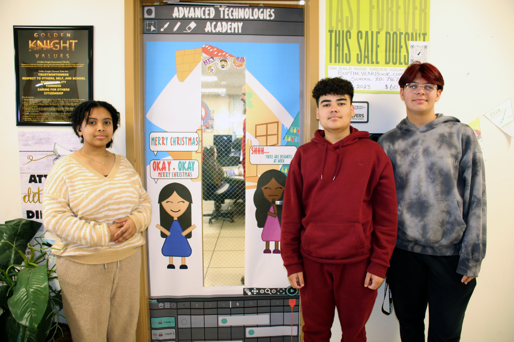 Lia, Joseph, and Cristian decorated Mr. Myers' classroom door.